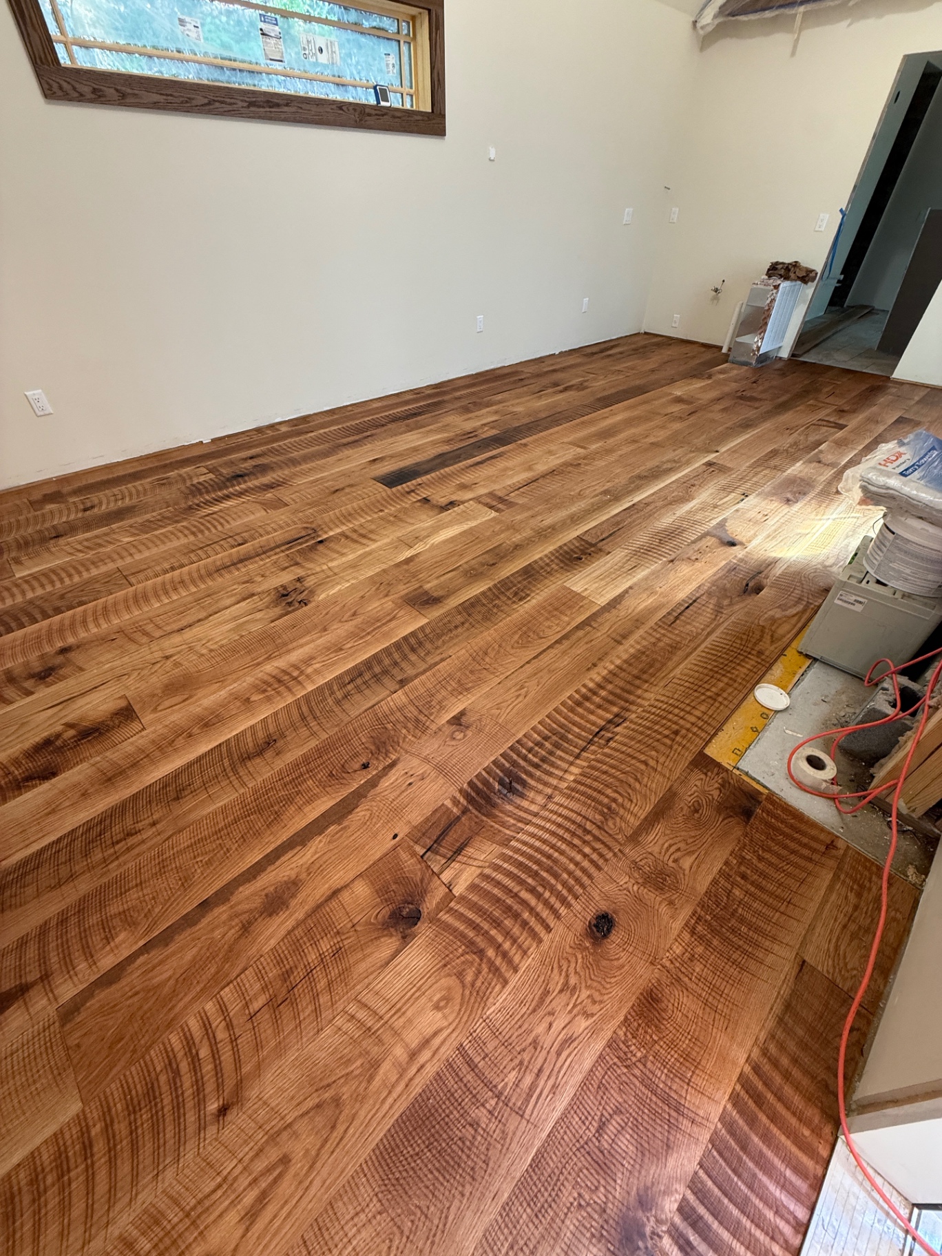 Reclaimed oak plank floor installed and finished in a Western North Carolina home