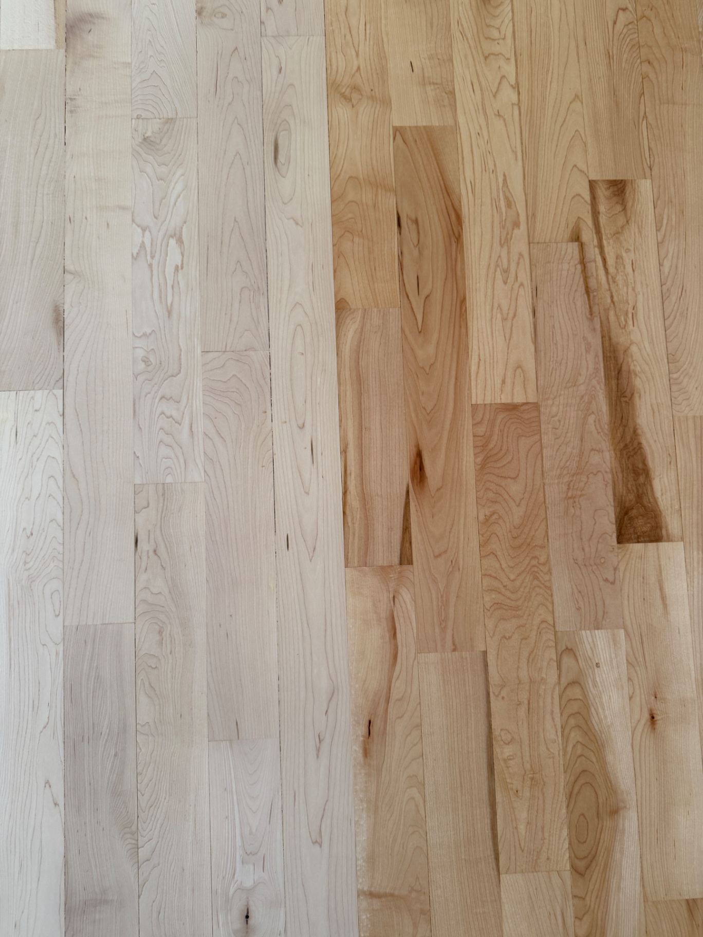 Hardwax oil being worked into a raw white oak floor by hand