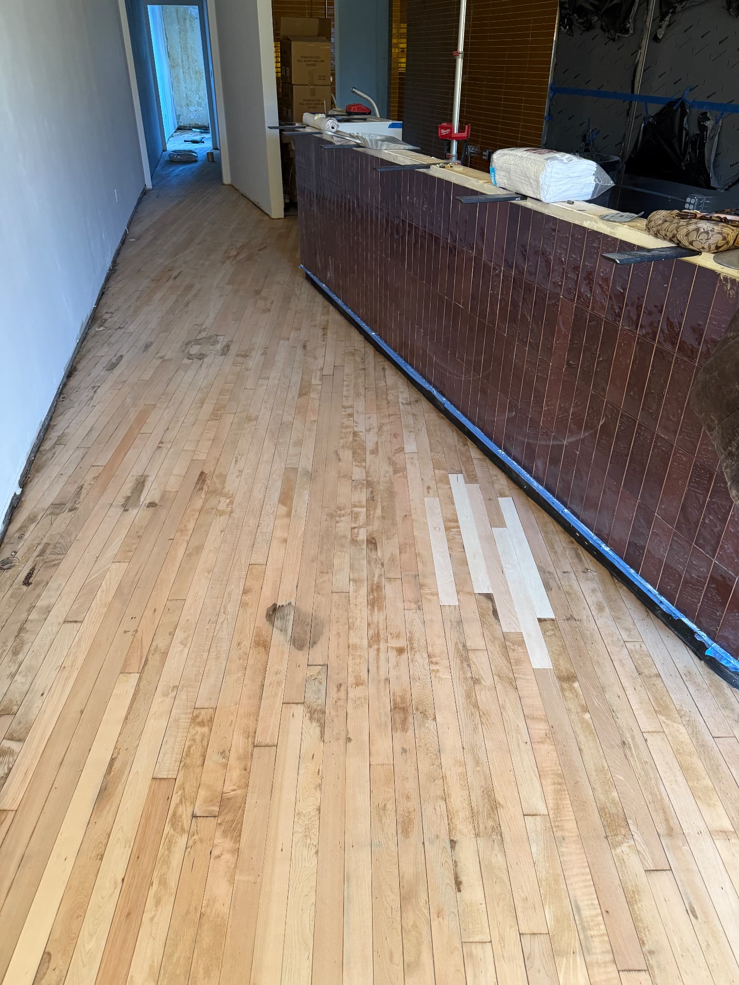 1932 Commercial Space, Vinyl Tile and Adhesive Off mid-sanding